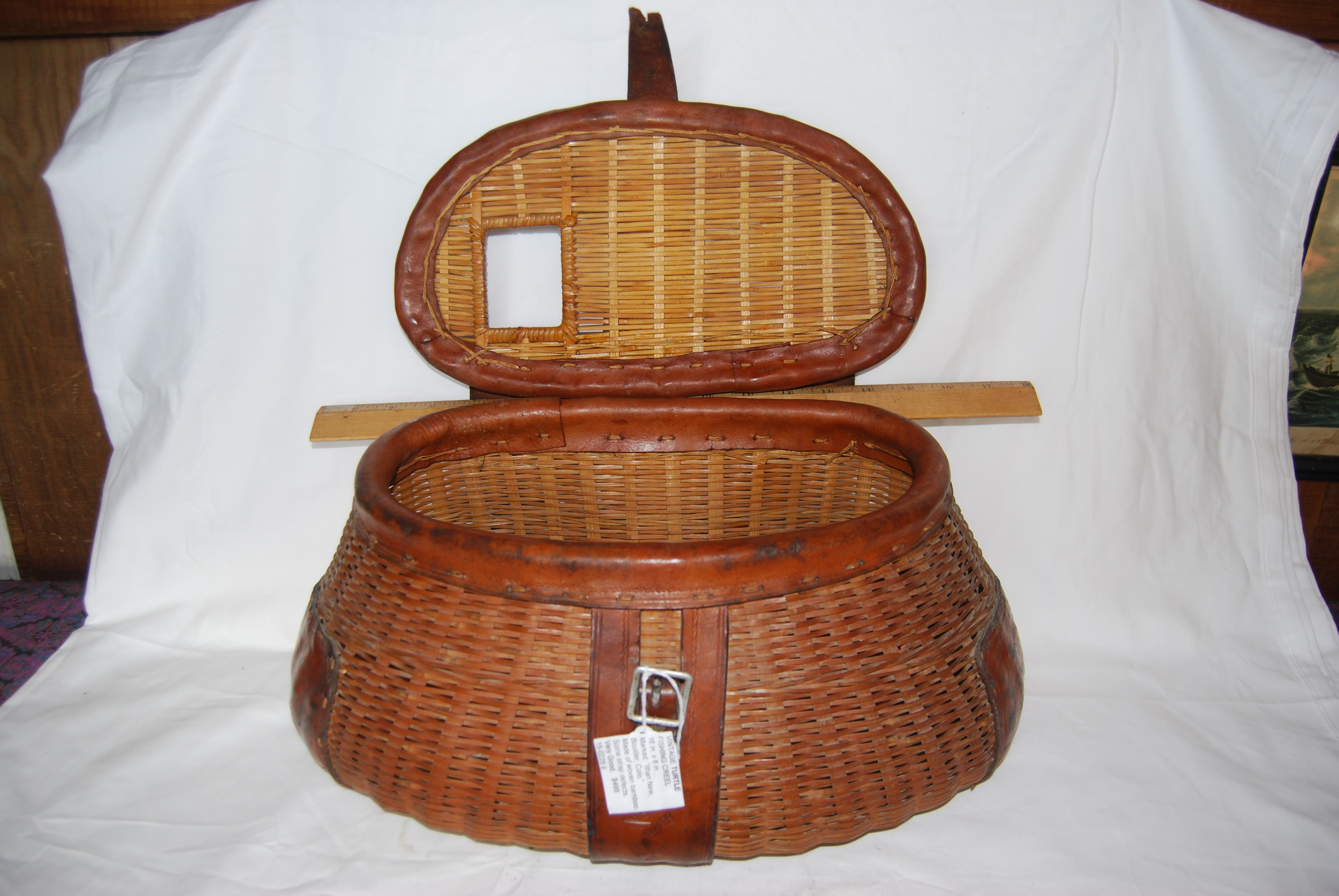 VINTAGE ANTIQUE “TURTLE” LEATHERED FISHING CREEL. Woven of split bamboo